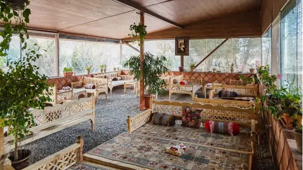 Traditional decorated tea house at Jahangardi Migun Hotel Tehran