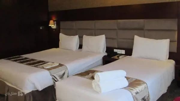 اتاق سه تخته در هتل آرامیس کیش