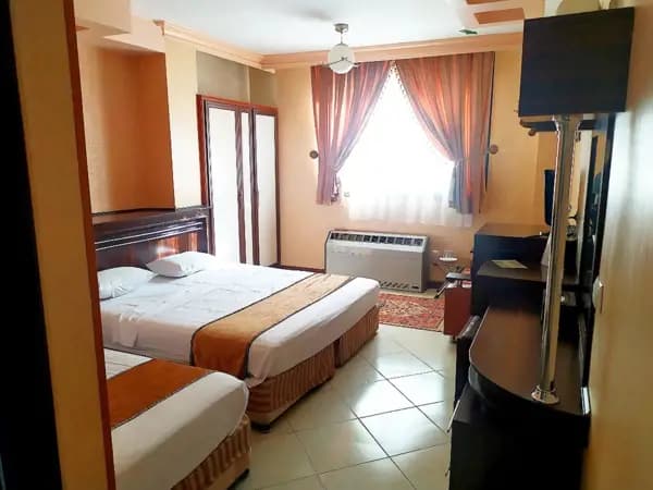 Triple room photo at Mahan Hotel Esfahan Triple room at Mahan Hotel Esfahan