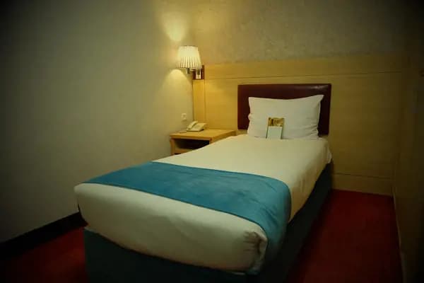 Single room without window photo at Parsian Kowsar Hotel Tehran Single room without window at Parsian Kowsar Hotel Tehran