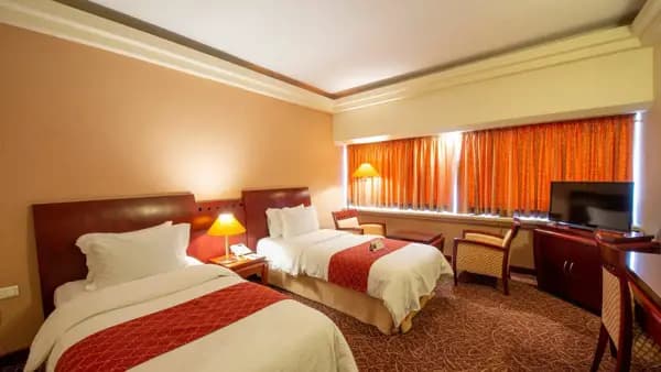 Photo of twin room at Homa Hotel Shiraz Twin room at Homa Hotel Shiraz