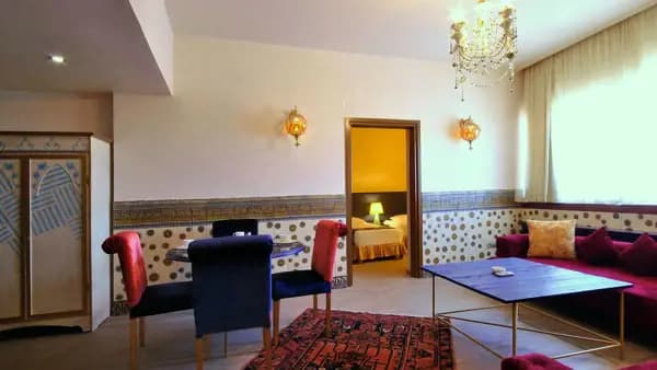 Two-bedroom four-bed apartment photo at Ferdows Hotel Mashhad Two-bedroom four-bed apartment at Ferdows Hotel Mashhad
